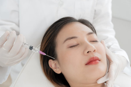 Cosmetic surgery, skin whitening injection, filler injection, HA Skin Booster, Botox, beautiful Asian girls receive beauty treatments at beauty clinic, skincare, pore rejuvenation, wrinkle, baby faceの写真素材