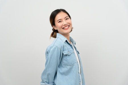 ortrait asian beautiful girl shy smile blank space isolated background. Happy woman on vacation. young female smiling success, billboard, introduction, advertisement, attractive, expression, positiveの写真素材