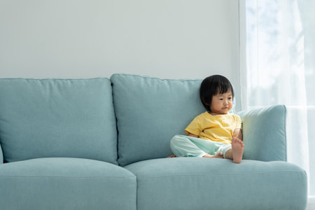 asian children are in a good mood, relaxed, happy, recreation, living room, childhood, lifestyle, preschooler, study, family,の写真素材