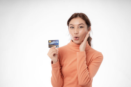 woman show credit card for online shopping at home. stay home, technology, electronic commerce,...