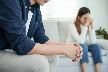 Divorce. Asian couples are desperate and disappointed after marriage. Husband and wife are sad, upset and frustrated after quarrels. distrust, love problems, betrayals. family problem, teenage loveの写真素材