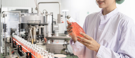 quality inspector food or beverages technician inspection about quality control food or beverages before send product to the customer. Production leader recheck ingredient and productivity.の写真素材