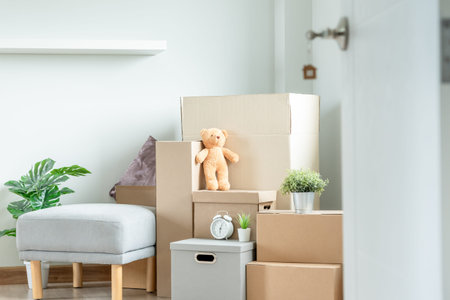 Moving house, relocation. The key was inserted into the door of the new house, inside the room was a...