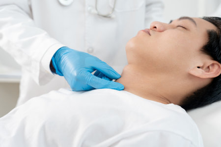 skin problem of asian man. Dermatologist use magnifying glass look itchy skin from skin allergic, steroid allergy, sensitive skin, chemical allergy, rash, insect bites, Dermatitis.の写真素材