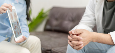 man with mental health problems is consulting. psychiatrist is recording the patient's condition for treatment. encouragement, love and family problem, bipolar , depression patient, protect suicideの写真素材