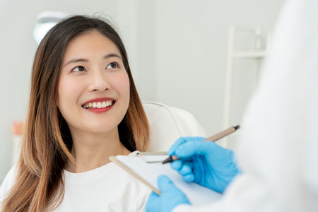 plastic surgery, beauty asian smile and happy after surgery, surgical procedure that involve altering shape of nose, doctor examines patient nose before rhinoplasty, medical assistance, healthの写真素材