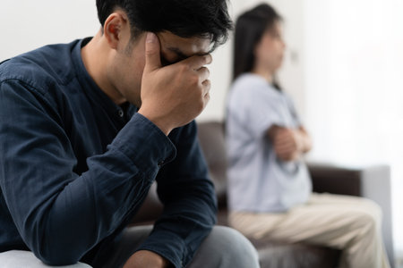 Divorce. Asian couples are desperate and disappointed after marriage. Husband and wife are sad, upset and frustrated after quarrels. distrust, love problems, betrayals. family problem, teenage loveの写真素材
