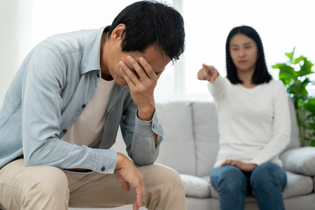 Divorce. Asian couples are desperate and disappointed after marriage. Husband and wife are sad, upset and frustrated after quarrels. distrust, love problems, betrayals. family problem, teenage loveの写真素材
