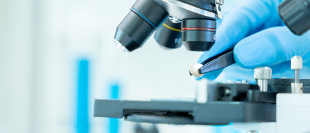 Scientist analyze biochemical samples in advanced scientific laboratory. Medical professional use...