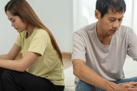 Divorce and quarrels. couples are desperate and disappointed after marriage. Husband and wife are sad, upset and frustrated after quarrels. distrust, love problems, betrayals. family problem.の写真素材