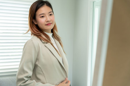 Beautiful woman preparing before job interview, building confidence, job applicants resume to...