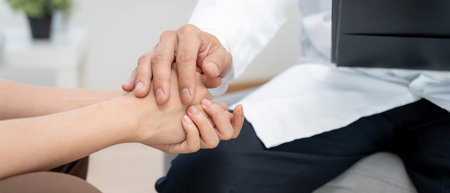 psychiatrist hold hand support each while discussing family issues. doctor encourages and empathy woman suffers depression. psychological, Hand in hand togetherの写真素材