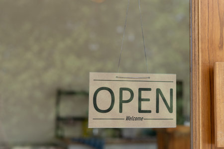 show sign open on the first day of business. guarantees safety, cleanliness, open the coffee shop....