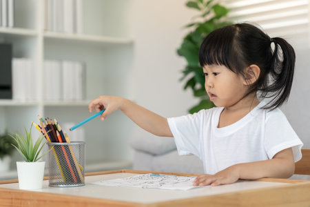 Happy children playing learning paint on paper. Activity, development, IQ, EQ, meditation, brain, muscles, essential skills, family having fun spending time together. Holidayの写真素材
