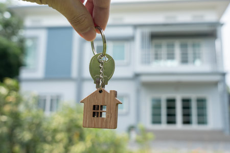 lease, rental and selling home. Real estate agent hold key for new house or real estate. rent house,...