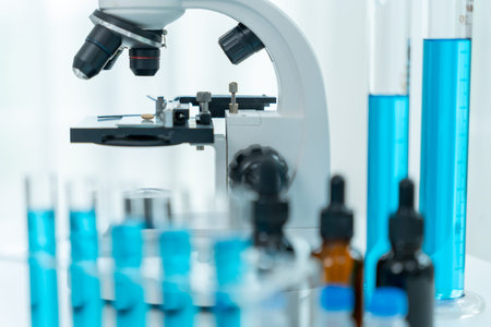 Scientist analyze biochemical samples in advanced scientific laboratory. Medical professional use...