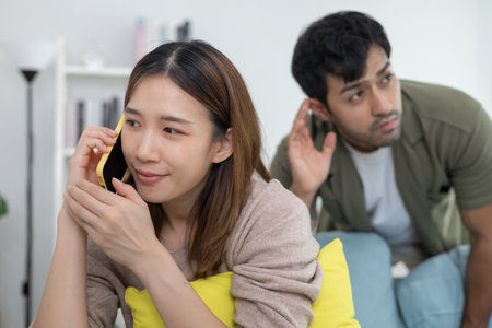 Double dating, wife use phone for call somebody, family problem, infidelity, divorce, separateの写真素材