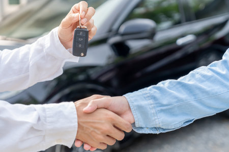 lease, rental car, sell, buy. Dealership shake hand customer for new Car. Sales, loan credit financial, rent vehicle, insurance, renting, Seller, dealer, installment,の写真素材