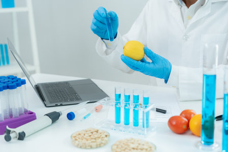 Scientist check chemical food residues in laboratory. Control experts inspect quality of vegetables  vegetables. lab, hazards, find prohibited substances, contaminate, Microscope,の写真素材