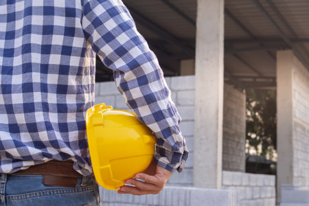 engineer hold helmet safety, industrial plant. Contractor and inspector inspection construction during project.civil Forman check quality assurance Utility fore man daily check.の写真素材