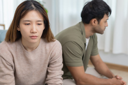 Divorce and quarrels. couples are desperate and disappointed after marriage. Husband and wife are sad, upset and frustrated after quarrels. distrust, love problems, betrayals.の写真素材