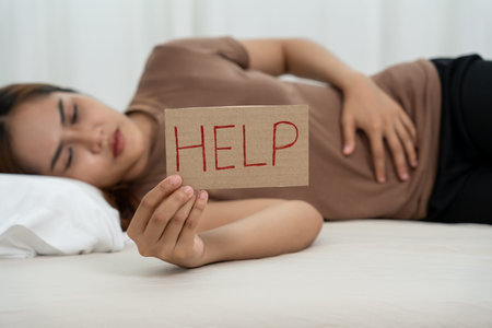 stomach ache. women have abdominal pain and hold help. indigestion, gastritis, menstrual cramps,...