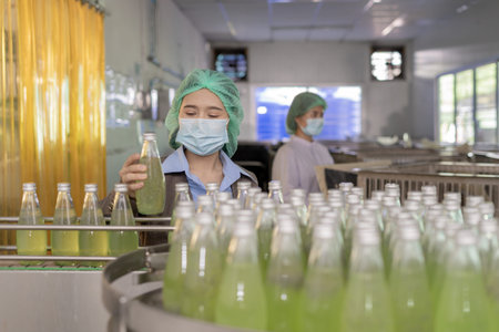 Business owner of food or beverages and quality team inspection about quality control food or...