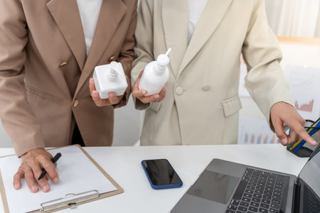 Business or working woman present product for customer, research and development discuss and point...
