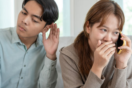 Double dating, wife use phone for call somebody, have a fling, Bit on the side , Commit adultery ,Polygamy, wife was having an affair. family problem, infidelity, divorce, separateの写真素材