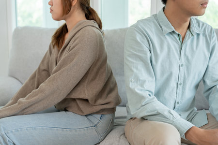Divorce. Asian couples are desperate and disappointed after marriage. Husband and wife are sad, upset and frustrated after quarrels. distrust, love problems, betrayals. family problem,の写真素材