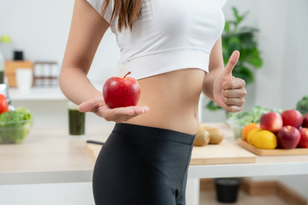 slim body asian women choose healthy foods, dieting female choose red apple for diet. Good healthy food. weight lose, balance, control, reduce fat,の写真素材