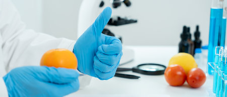 Scientist guaranteer no chemical on fruit residues in laboratory. Control experts inspect the concentration of chemical residues, standard, find prohibited substances,の写真素材