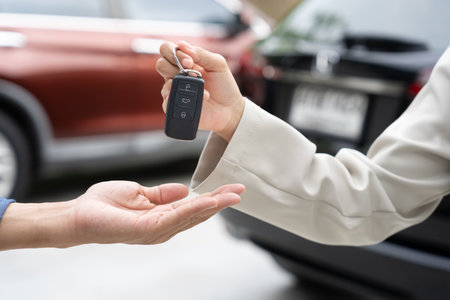 lease, rental car, sell, buy. Dealership manager send car keys to the new owner.  Sales, loan credit financial, rent vehicle, insurance,  renting, Seller, dealer, installment,の写真素材