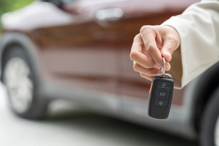 Used car, rental car, sell, buy. happy pass on key for new owner.  Sales, loan credit financial, rent vehicle, insurance,  renting, Seller, dealer, installment,の写真素材