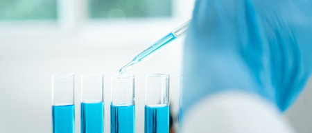 Scientist analyze biochemical samples in advanced scientific laboratory. Medical professional use dropper mix microbiological developmental of viral.の写真素材