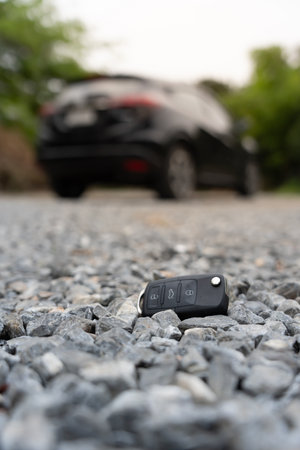 Lost car keys on the ground, Car keys dropped on the floor or fall lying on the street home front. Walking Away From Lost Car Key, can not transport, rush time, wast time,の写真素材