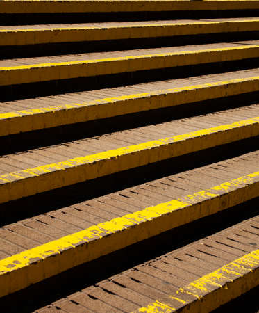 brick stairs with yellow pant on the edges の写真素材
