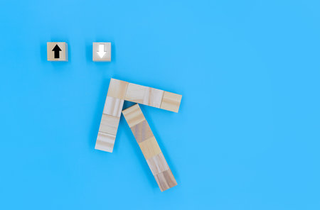 Woodblock arrows to select a dropの写真素材