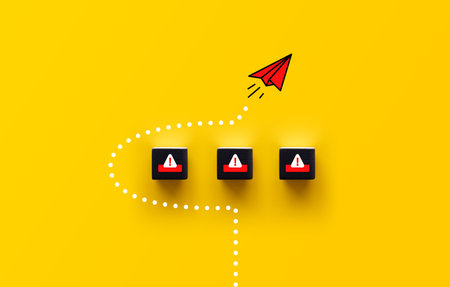 Concept of overcoming barriers, goal, target. Red paper plane