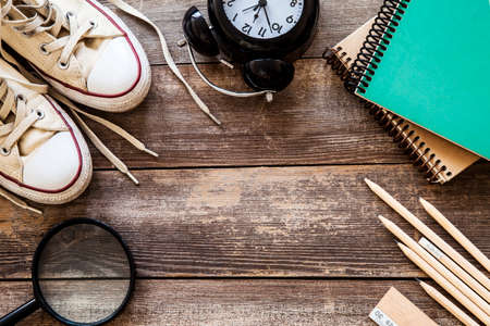 School supplies on wooden background.の写真素材