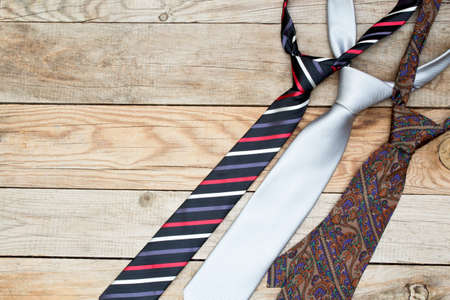 Neckties on wooden background. Top view. Father's Day.の写真素材