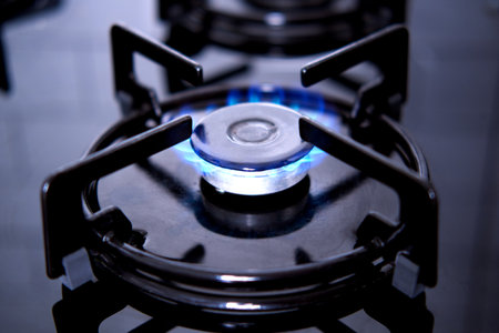 Close-up of a burning gas stove.