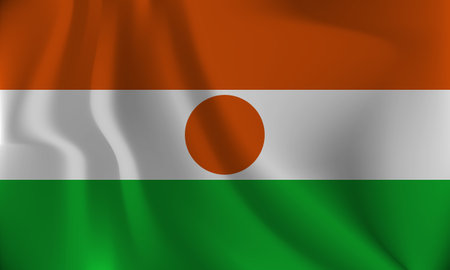 Flag of Niger, with a wavy effect due to the wind.のイラスト素材