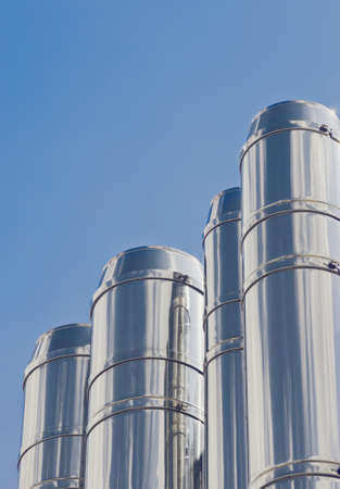 Steel pipes and pipelines,  abstract industrial background. Modern technology texture. Silver and...