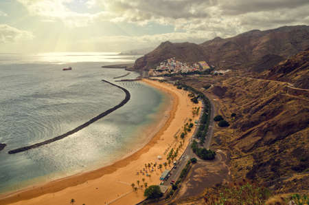 Aerial view of Playa de Las Teresitas near Santa Cruz de Tenerife. Overcast cloudy beach landscape. Yellow sand beach in the north of Tenerife. Canary Islands, Spainの写真素材