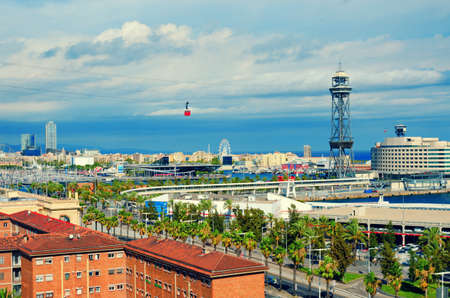Aerial view of Barcelona. La Barceloneta, Port Vell, sea and red cabin of the cableway. Catalonia, Spain.の写真素材