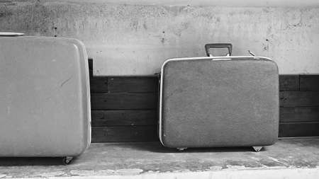 Vintage luggage in black and white background.の写真素材