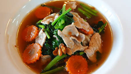 Rad na is Thai local noodle dish served with noodle, pork meat and gravy on top. Thai local food.の写真素材