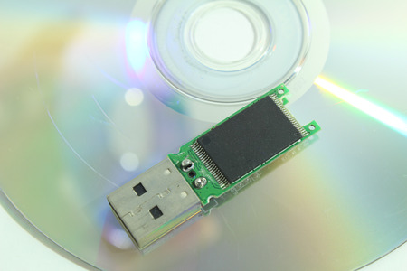 CD and flash drives, the disk is broken.の写真素材