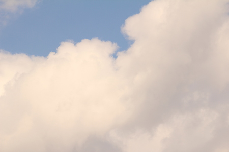 White clouds against the blue sky.